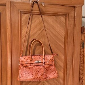 Chic burnt orange embossed animal print Leather Satchel